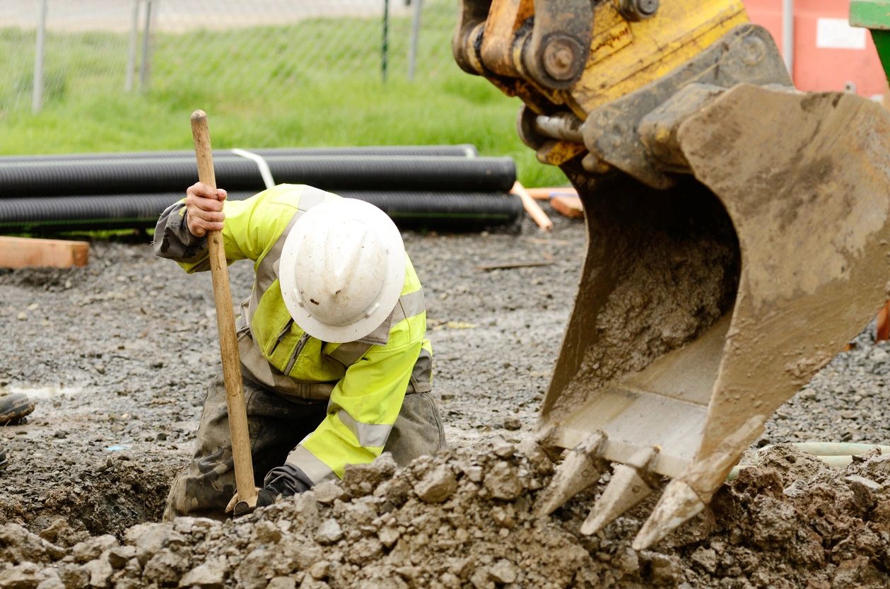 Worker digging